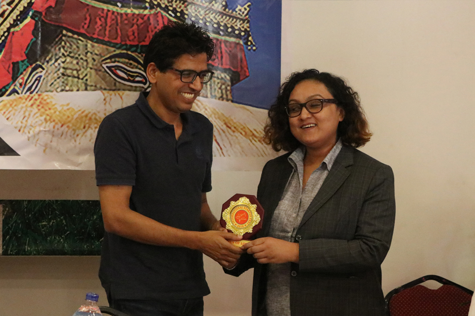 Narottam Aryal Receiving Token of Love from Bandita Thapa, Managing Director of Butterfly Ventures.jpg